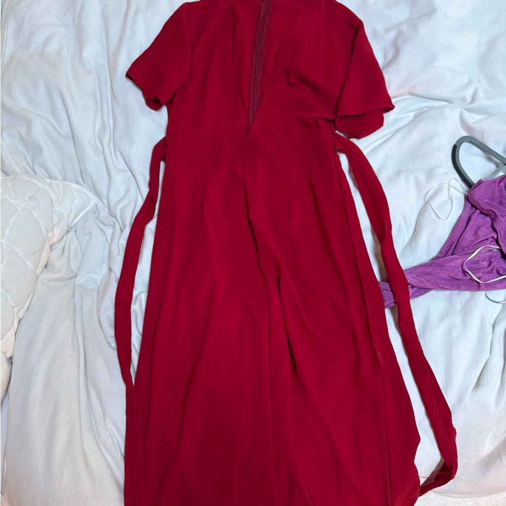 Red Jumpsuit with Deep V Cut